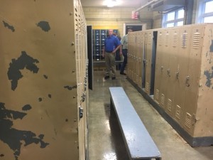 Teutopolis Board Members inspect the High School boy's locker room.