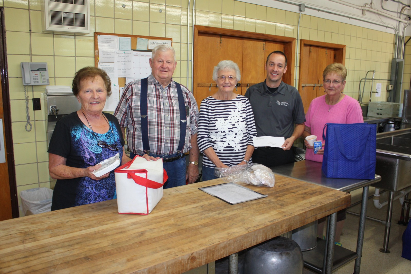 Representatives of the Teutopolis site of CEFS/Golden Circle Nutrition Program recently accepted a grant from Teutopolis State Bank. Pictured (L-R): Mable Harris, George Westendorf, Jeanette Westendorf, Jerry Runde (Teutopolis State Bank representative), and Nancy Hoene.