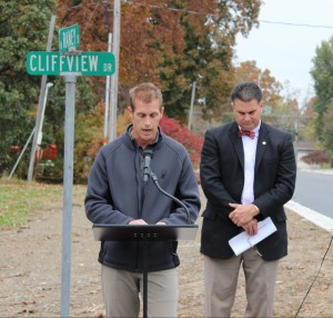 City Engineer Jeremy Heuerman and Mayor Jeff Bloemker dedicate N. Raney Street Thursday morning.