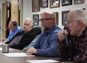 Board Member John Perry dicusses possible cuts to the county budget.  (Pictured L-R) County Clerk Kerry Hirtzel, Board Members Dave Campbell, Jeff Simpson, John Perry, Lloyd Foster. 